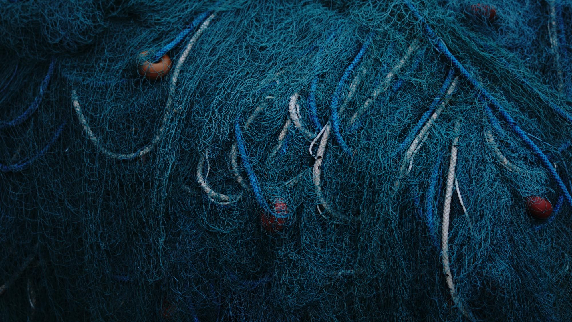 Close-up of futuristic embroidery on dark fabric